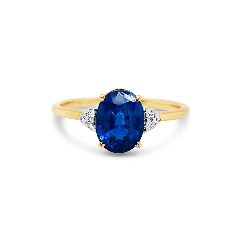 floral engagement rings for women -Blue Sapphire Oval And Diamond Ring In 18K Yellow Gold