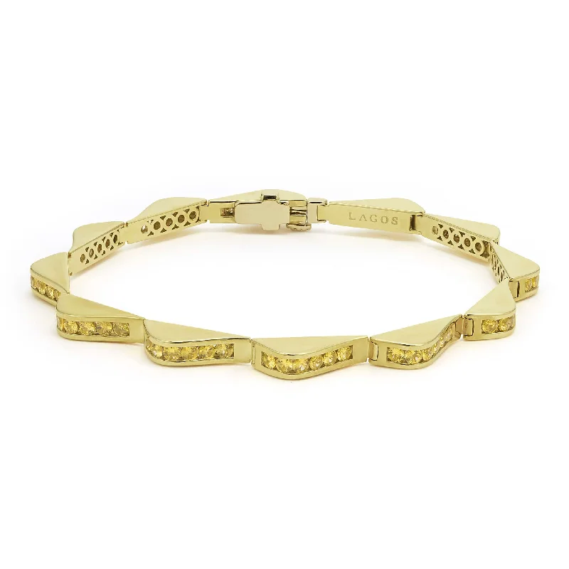 bold statement bangles for women -Studio 18K Gold Yellow Sapphire Link Wave Bracelet