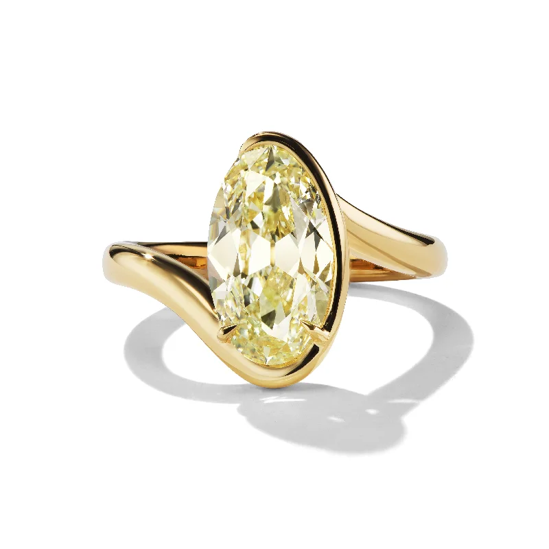 pear shaped engagement rings for women -Yellow Oval Diamond in Wave Setting