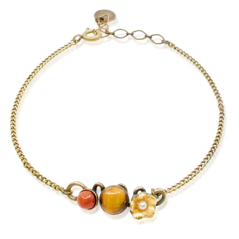 colorful gemstone bracelets for women -Garnet and Tiger's Eye Flower Bracelet by Eric et Lydie